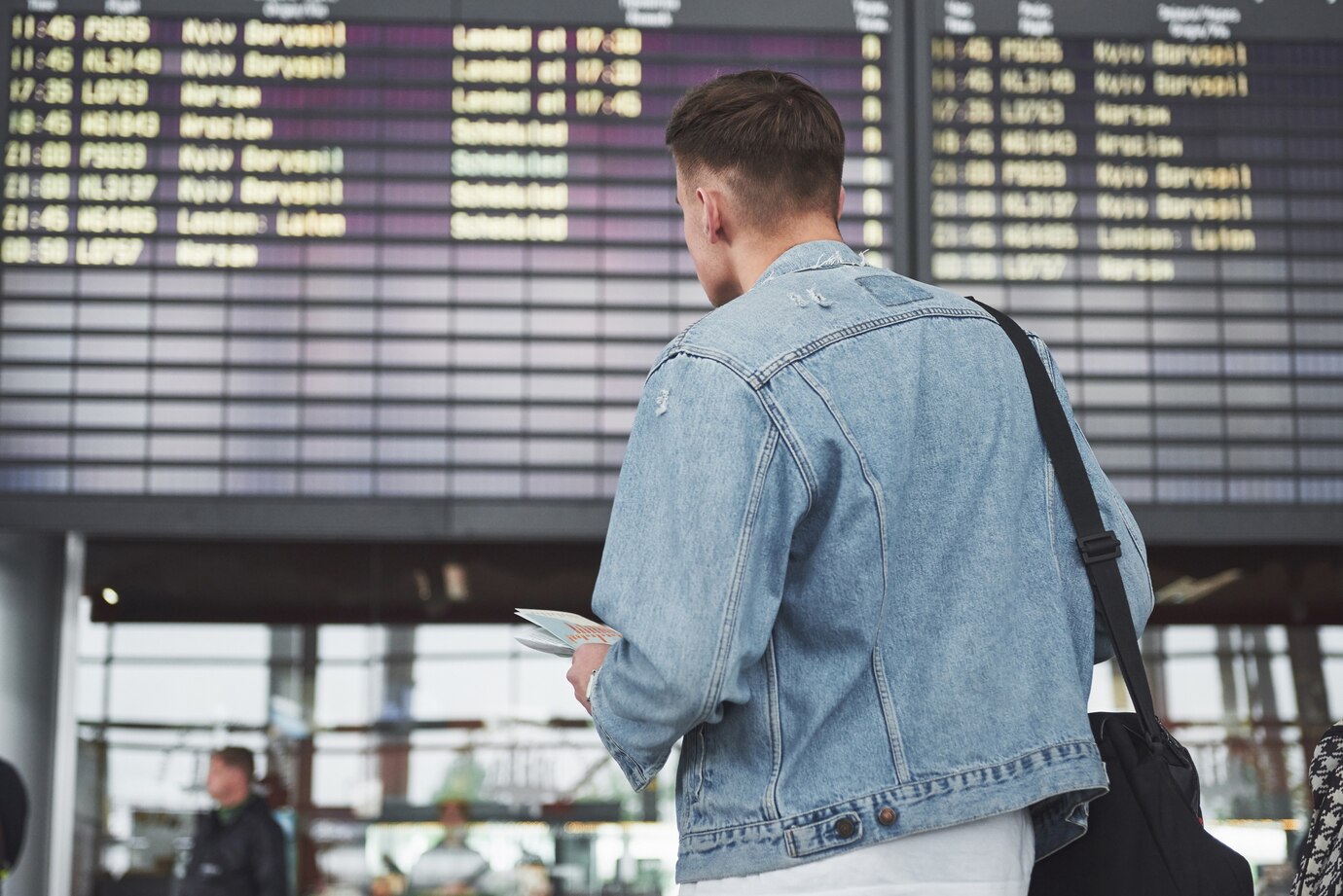 a traveler checking flight info